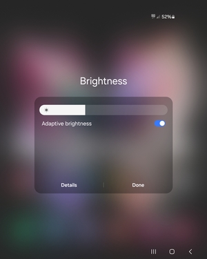 Turn on Adaptive brightness and select Done