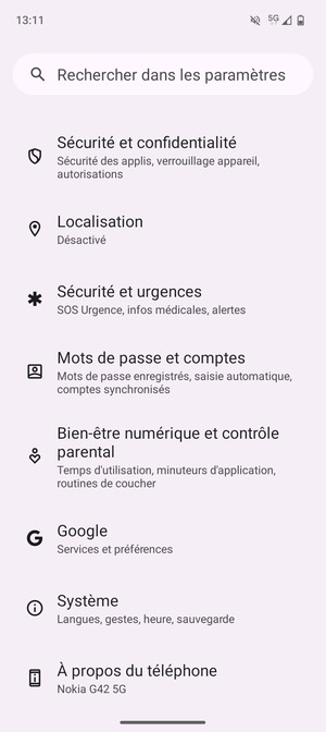 Retournez au menu Paramètres et sélectionnez Mots de passe et comptes