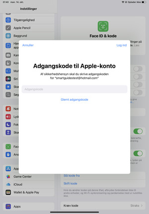 Indtast Adgangskode til Apple-id og vælg Log ind