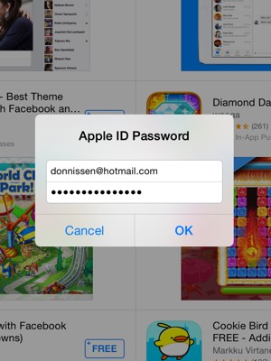 Indtast Apple-ID Brugernavn og Adgangskode. Vælg OK