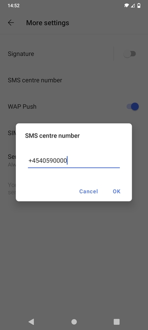 Enter the SMS centre number and select OK