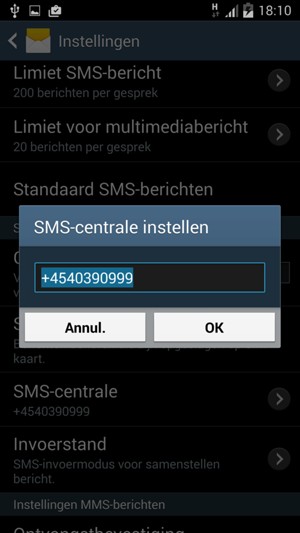 Voer het SMS-centrale nummer in en selecteer OK