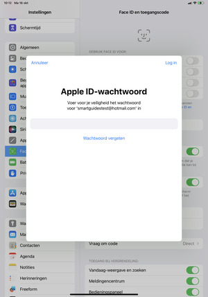 Voer Apple ID-wachtwoord in en selecteer Log in