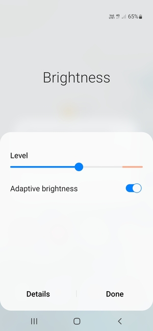 Turn on Adaptive brightness and select Done