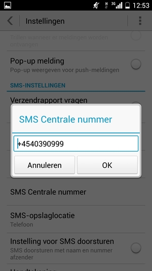 Voer SMS Centrale nummer in en selecteer OK